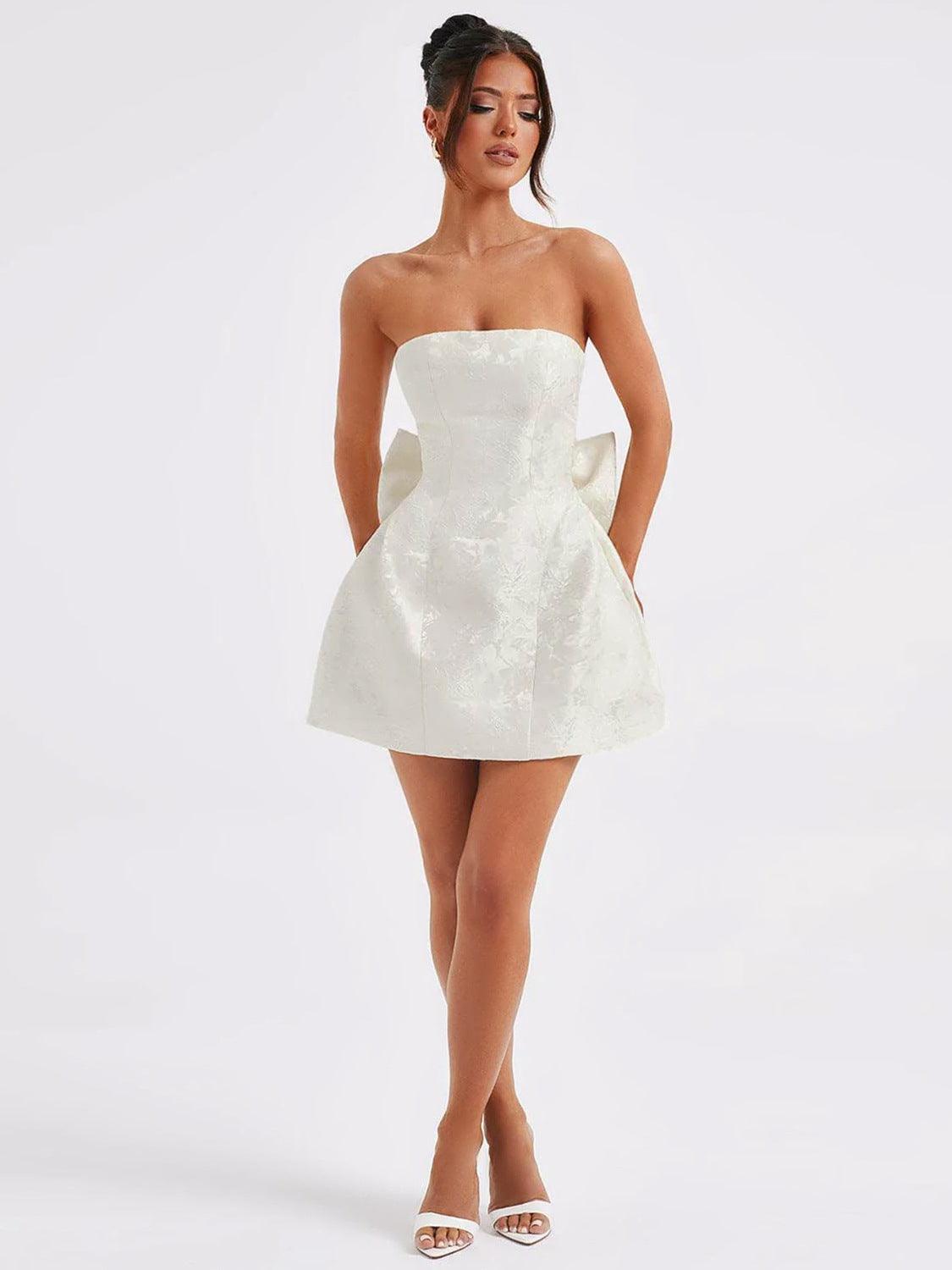 Lace-up sleeveless satin mini dress with bow in off-white.